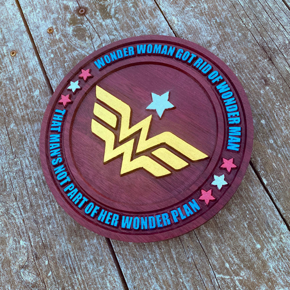 Precision carved Purpleheart wood sign with painted Wonder Woman emblem and bold lettering, hand stained and finished in USA for unique decor and gifts.