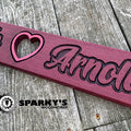 We Love Arnold Wood Sign - Purpleheart