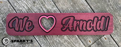 We Love Arnold Wood Sign - Purpleheart
