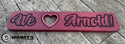 We Love Arnold Wood Sign - Purpleheart